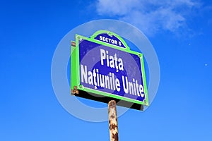 Beautiful vintage street sign showing Piata Natiunile Unite (United Nations Square) displayed on an street