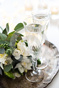 Beautiful vintage wedding decoration with champagne and white fl