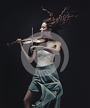 Beautiful Violinist Woman portrait photo