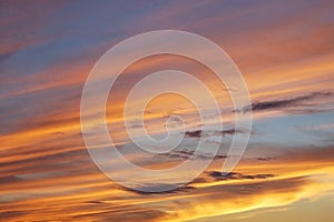 Beautiful vivid sunset sky with floccus clouds