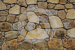 Beautiful wall of texture stones. Stone masonry