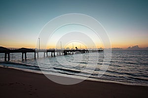 Beautiful warf at the beach during sunrise