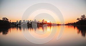 Beautiful warm sunset at Londrina city and Igapo lake photo