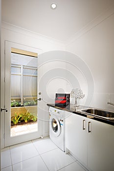 Beautiful washing room with a washing machine