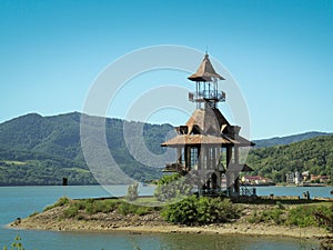 Beautiful watchtower on Danube river shore, in Orsova, Romania.