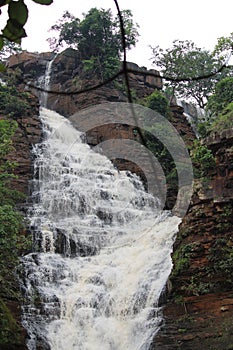 Beautiful water falling down from natural stairs from Tirathgarh Waterfall