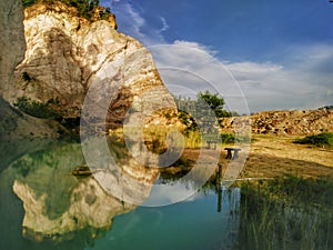 A beautiful water reflections in an abandoned quarry