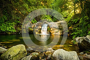 Beautiful water stream in PoÃ§o da Cilha waterfall, Manhouce, Sao Pedro do Sul, Portugal. Long exposure smooth effect. Mountain photo