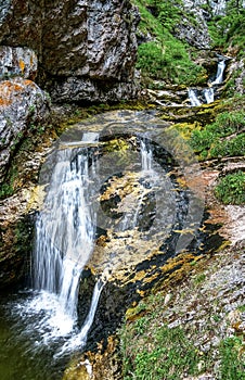 Beautiful waterfall in austrian Alps photo