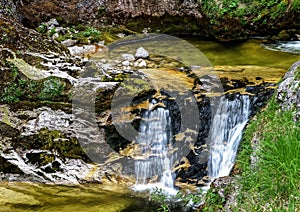 Beautiful waterfall in austrian Alps photo