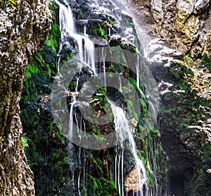 Beautiful waterfall in austrian Alps photo