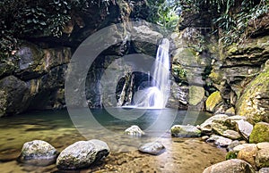 Beautiful waterfall, with clear waters, in Serra do Mar photo