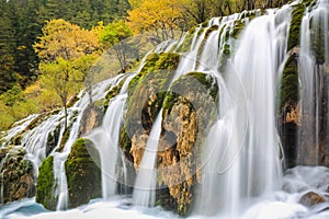 Beautiful waterfall in colorful autumn