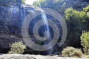 A beautiful waterfall flowing in the greenery