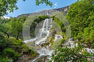 Beautiful waterfall flushing down a mountainside in Norway