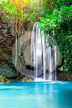 Beautiful waterfall in forest at Erawan National Park in Thailand