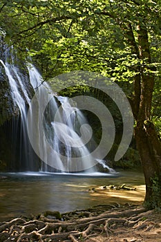 Beautiful waterfall in france on beautiful summer day