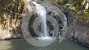 Beautiful waterfall in the jungle of Lombok, Indonesia