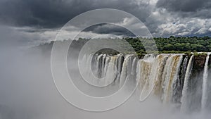 Beautiful waterfall landscape. Streams of water cascade into the abyss