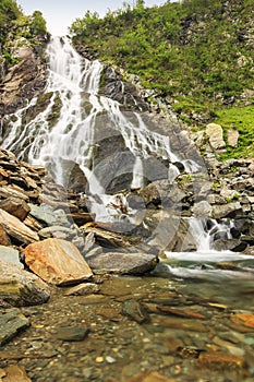 Beautiful waterfall in the mountains,Balea cascades,Fagaras mountains,Carpathians,Romania