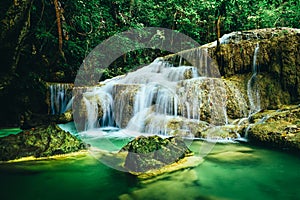 Beautiful waterfall in the rainforest jungle of thailand. Erawan waterfall in Erawan National Park, kanchanaburi,Thailand