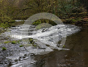 Beautiful waterfall on the River Cusher in the Clare Glens Forest