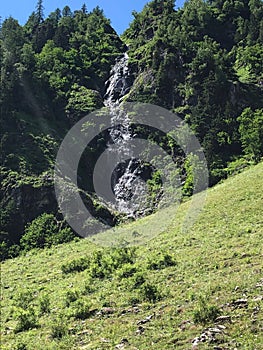 beautiful waterfall on rock photo