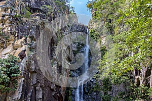 Beautiful waterfall among the rocks on a mountainside in the Serra do Cipo photo