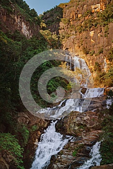Beautiful waterfall. Scenic nature background.