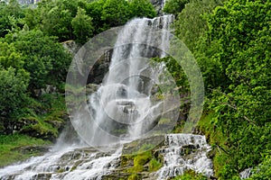 Beautiful waterfall surrounded by lush green vegetation