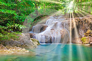 Beautiful waterfall in wild rainforest in Erawan National park, Thailand