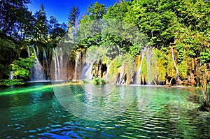 Waterfalls and clear blue lakes of Plitvice Lakes National Park, Croatia photo