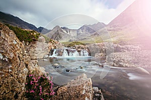 Beautiful waterfalls scenery on the Isle of Skye, Scotland: The Fairy Pools, Glen Brittle, Scotland. Sunshine