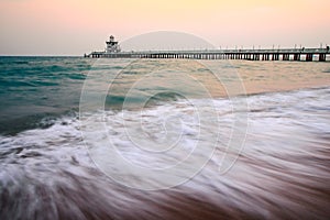 Beautiful wave with old bridge