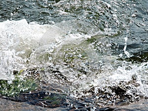 Beautiful  wave with spay, Suomenlinna, Helsinki,  Finland