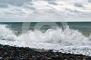 Beautiful waves of the sea foaming, breaking