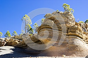 Beautiful weathered sandy layers due rock weathering are on hiking trail to lunar landscape. Tenerife, Canary Islands. Spain