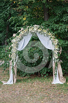 Beautiful wedding arch for the ceremony of flowers