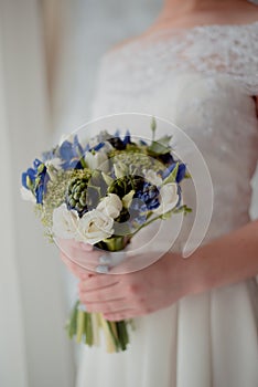 Beautiful wedding bouquet in bride's hands
