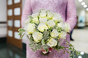 Beautiful wedding bouquet in bride`s hands
