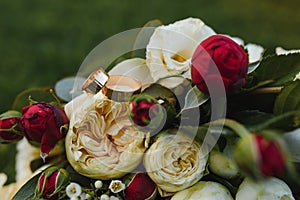 Beautiful wedding bouquet of bride wedding flowers fresh pink roses and alstroemeria bridal decoration. Fresh wedding flowers in