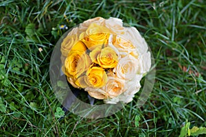 Beautiful wedding bouquet of flowers and greenery and blur background, selective focus. Amazing happy sunny day