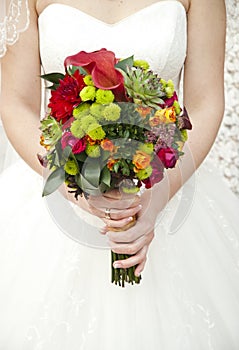 Beautiful wedding bouquet in hands bride