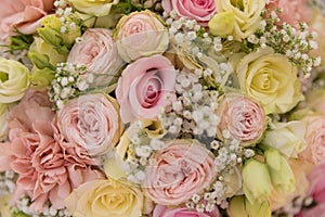 A beautiful wedding bouquet made of roses is