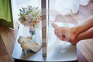 Beautiful wedding bouquet and white shoes