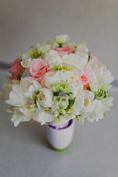 Beautiful wedding bouquet of white tulips and pink