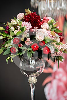 Beautiful wedding bouquets of the bride and girlfriend of the bride on a dark background