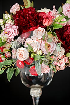 Beautiful wedding bouquets of the bride and girlfriend of the bride on a dark background