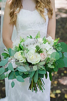 Beautiful wedding bride in the park-2