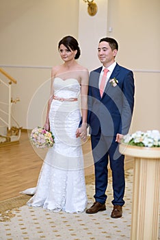 Beautiful wedding colorful bouquet and dress for bride